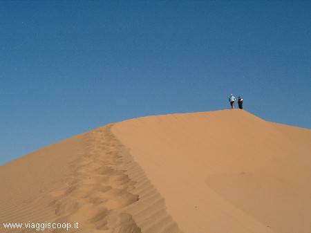 On the dunes at the end of the trekking
