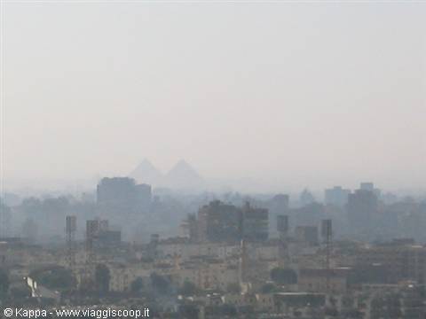 The Cairo's skyline from the Citadel , with the Giaza plain at the horizon