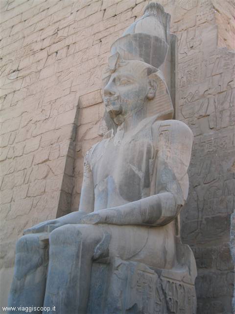 One of the six Ramses statues at the entrance of his temple in Luxor