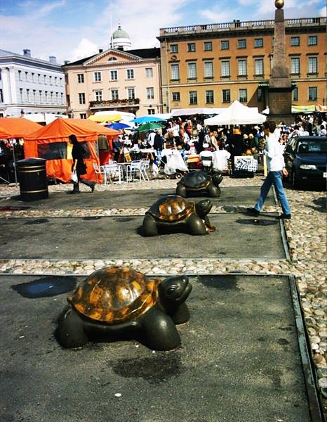 Bronze turtle sculptures on Helsinki Market Square