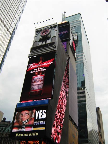 Times Square, New York: skyscrapers with glowing Budweiser and Panasonic billboards