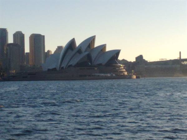 Sydney Opera House with white sails seen from the ferry