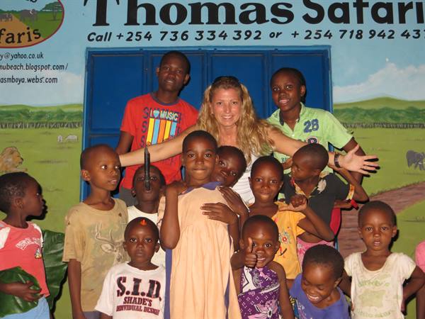 The children of Thomas's Village and his real estate agency in Watamu