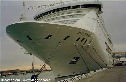 The Costa Victoria cruise ship moored at the dock with mooring lines