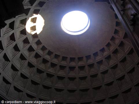The oculus of Rome's Pantheon, sunlight streaming through the concrete dome