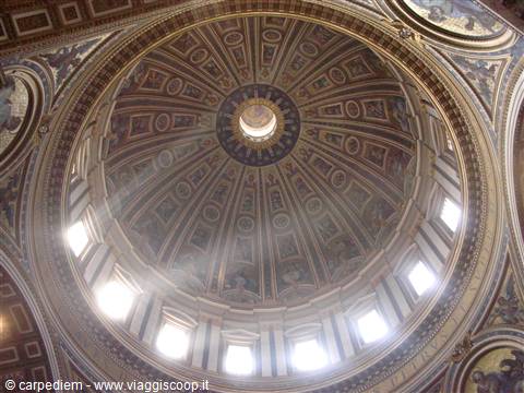St. Peter's Basilica dome in the Vatican, golden mosaics lit by windows