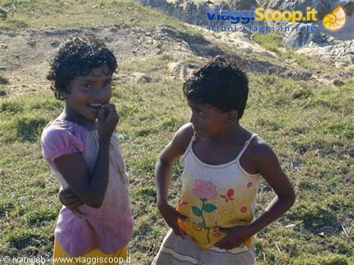 Children curious about the tourists. They speak Italian from the few tourists who reach Dickwella