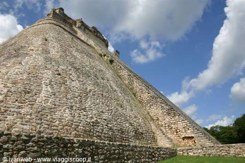 Pyramid of the Magician at Uxmal, limestone steps under white clouds