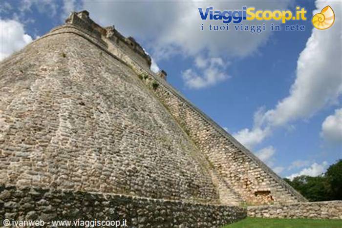 Pyramid of the Magician at Uxmal, limestone steps under white clouds
