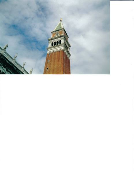 St Mark's red brick bell tower rising among clouds, Venice