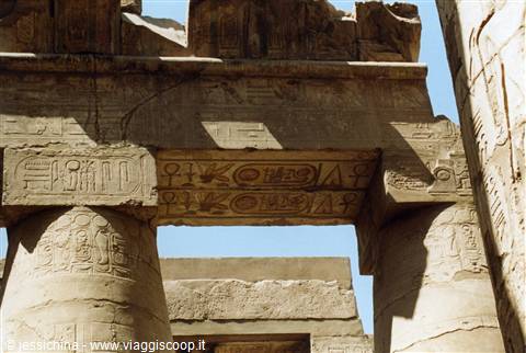 Stone columns carved with hieroglyphs at Karnak temple, Luxor