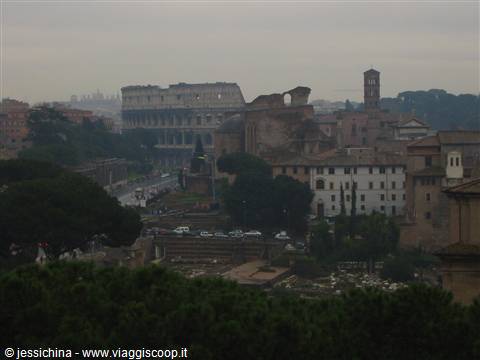 The Colosseum and Roman Forum shrouded in mist in Rome