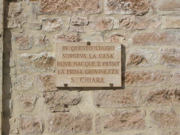 Stone plaque on wall marking the birthplace of Saint Clare, Assisi