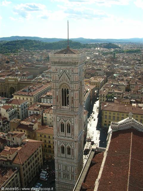 Giotto's bell tower in Florence, white and green marble above the rooftops