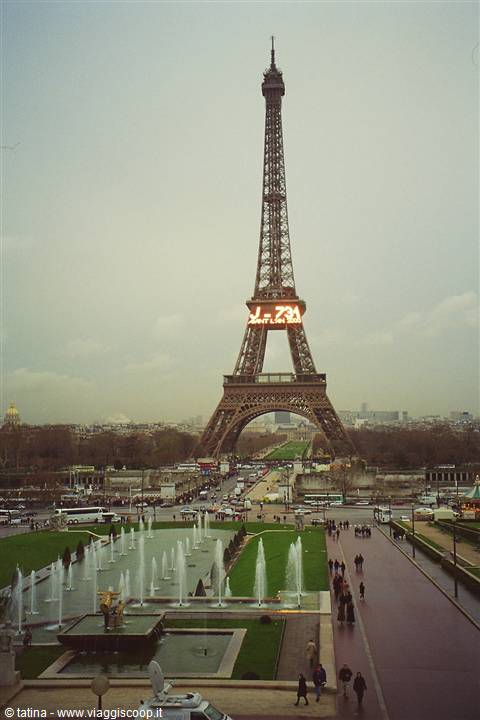 The Eiffel Tower seen from the Jardins du Trocadéro with fountains and people