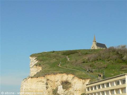 Notre-Dame de la Garde chapel atop the chalk cliff at Étretat