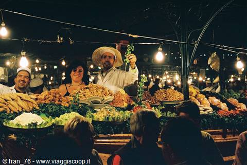 stalls filling the square of marrakesh as the sun sets