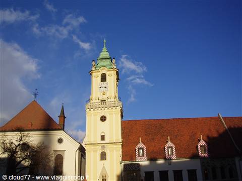 Yellow belfry tower with green dome of Bratislava's Old Town Hall