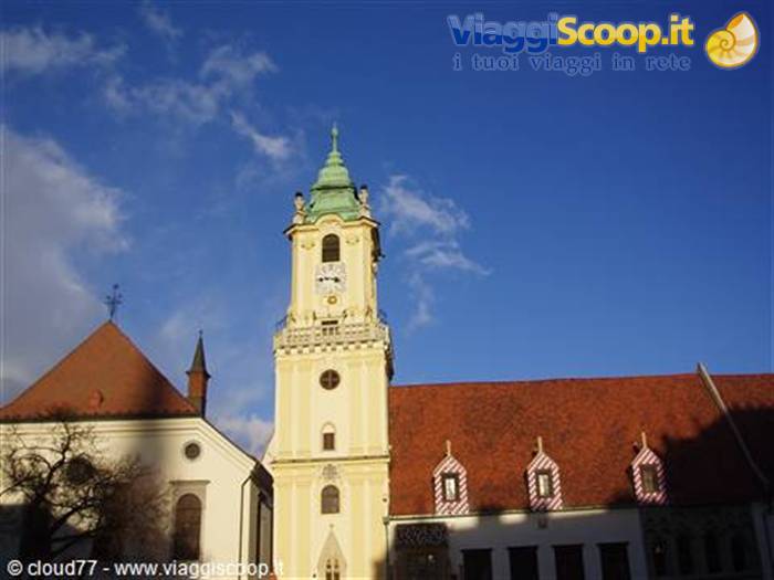 Yellow belfry tower with green dome of Bratislava's Old Town Hall