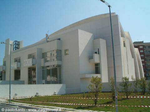 Dio Padre Misericordioso Church in Rome, white concrete sails under bright sun
