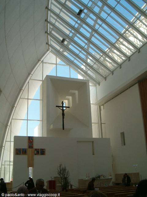 Crucifix inside Dives in Misericordia church in Rome, white sails and glass roof