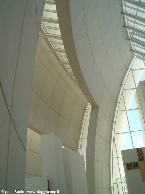 White curved concrete walls inside the Jubilee Church in Rome