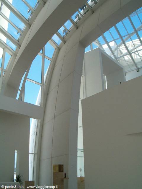 White concrete sails and glass skylights of the Jubilee Church in Rome