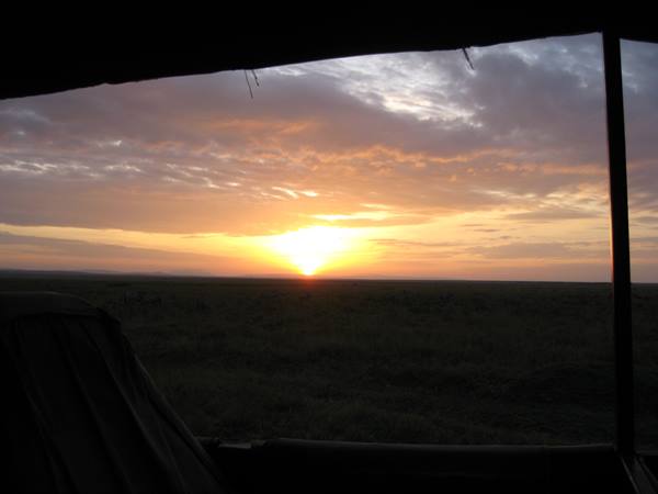 5.45 am - The sun rises in the Masai Mara - August 2008