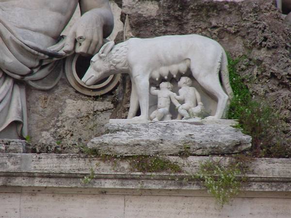 Marble statue of the she-wolf nursing Romulus and Remus in Rome