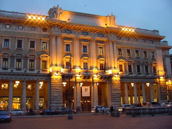 Palazzo della Borsa lit up at night in Piazza de Ferrari, Genoa