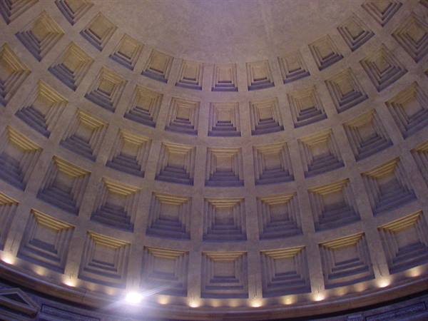 The coffered concrete dome of the Pantheon in Rome under warm light