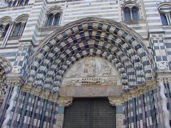 Romanesque striped arch portal with Christ mosaic, San Lorenzo Cathedral, Genoa