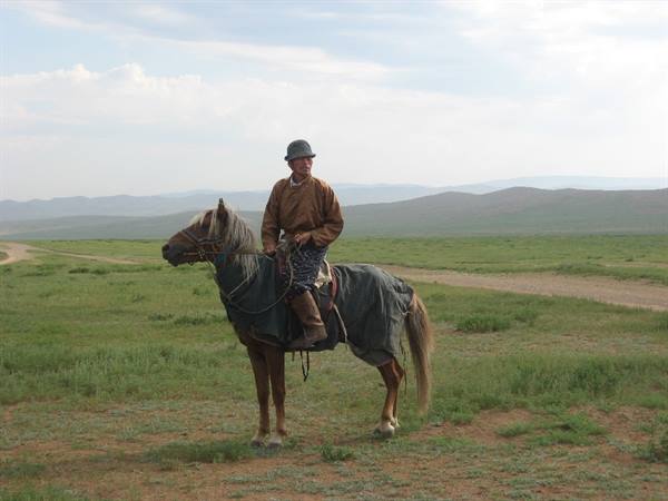 Rider in the Mongolian steppe