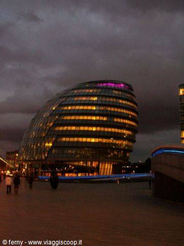 Buildings along the Thames at night