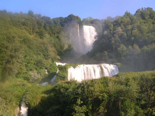 Marmore Falls: white water cascading down through lush green vegetation