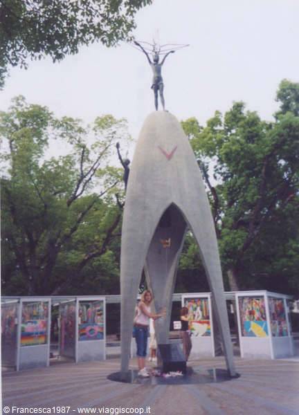 Woman in front of the Children's Peace Monument in Hiroshima