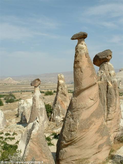 Fairy chimneys in Cappadocia, tuff pillars topped by boulders, daylight
