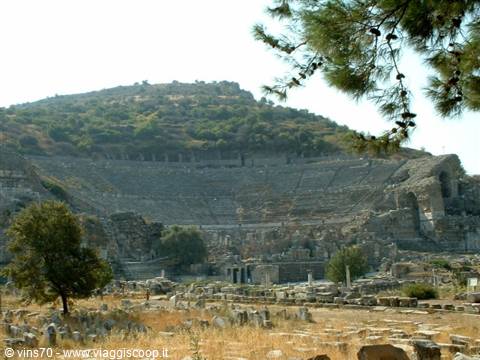 The great ancient theatre of Ephesus carved into the hillside among ruins and pines