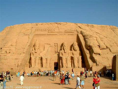 Tourists in front of Ramses II colossi at Abu Simbel temple