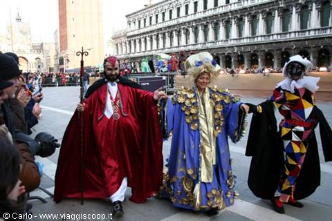 Masked costumes in St Mark's Square, Venice, during Carnival