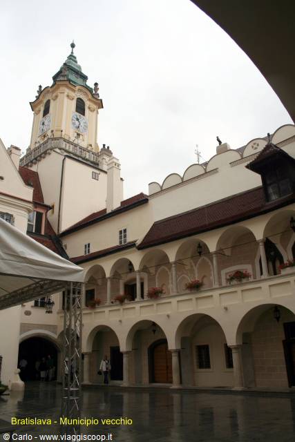 Arcaded courtyard of Bratislava Old Town Hall with clock tower above