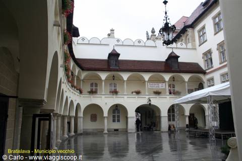 Arcaded courtyard of Bratislava Old Town Hall, wrought-iron lantern