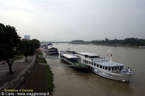 Cruise ships moored on the Danube in Bratislava, grey sky