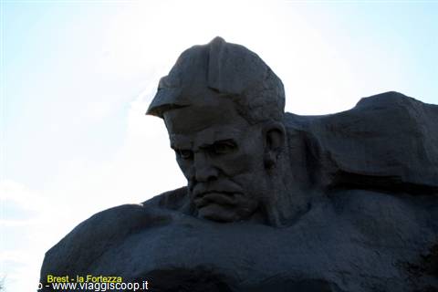Brest Fortress: stone monument to the Soviet soldier against the sky