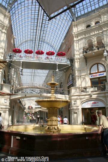 Golden fountain under the glass vault of GUM department store, Moscow