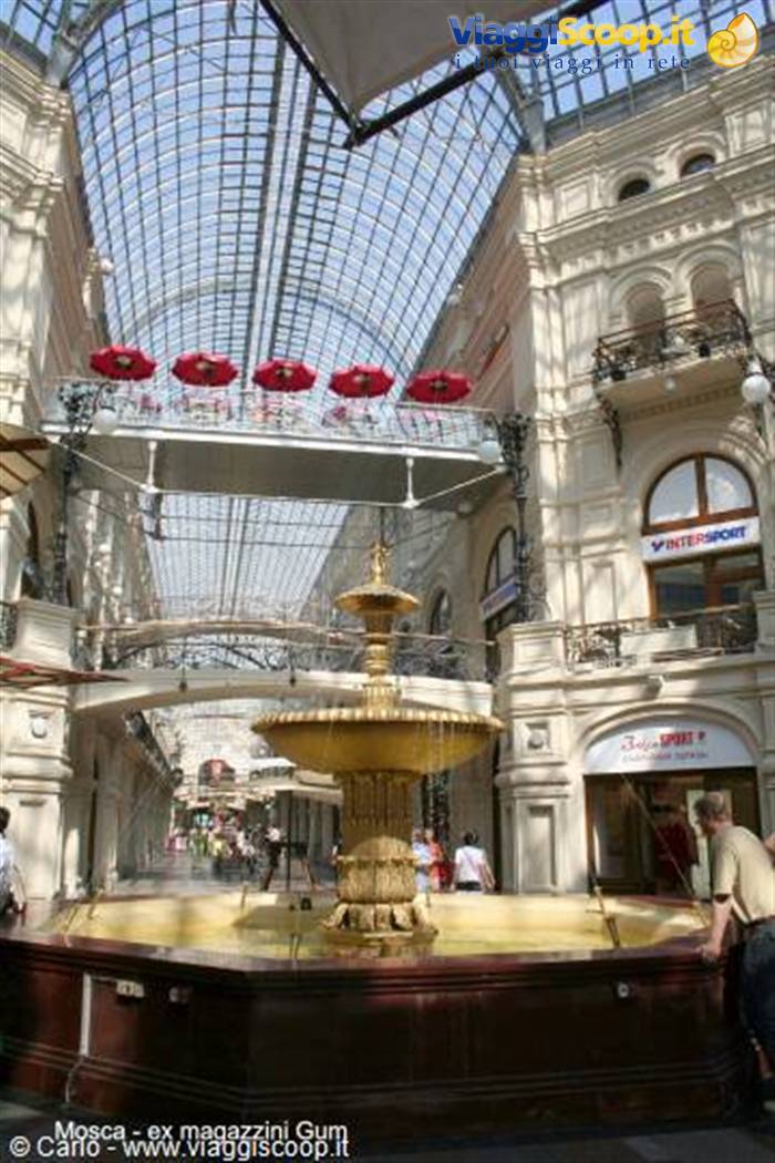 Golden fountain under the glass vault of GUM department store, Moscow