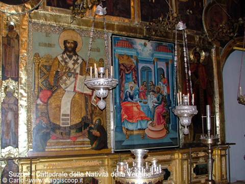 Suzdal, Nativity Cathedral: gilded icons and hanging silver vigil lamps