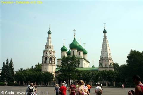 Church of Elijah the Prophet in Yaroslavl, green domes, tourists in sunny square