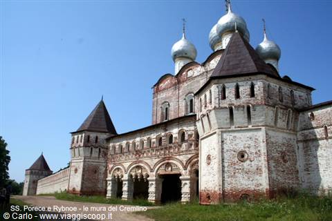 White towers and silver domes of Rostov Kremlin fortress under sunny sky