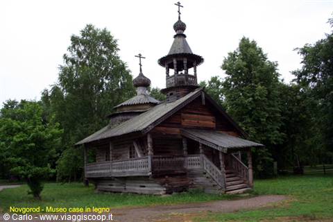 Wooden church with Orthodox domes and crosses, Novgorod open-air museum